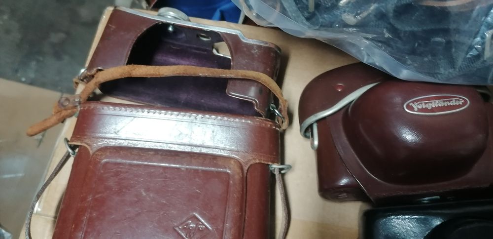 Conjunto bolsas couro máquinas fotográficas