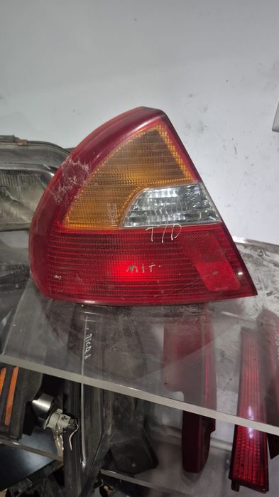Farolim esquerdo painel mitsubishi lancer 98