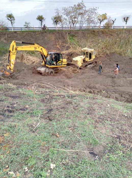 Работа эксковатора,грейдера,самосвалы