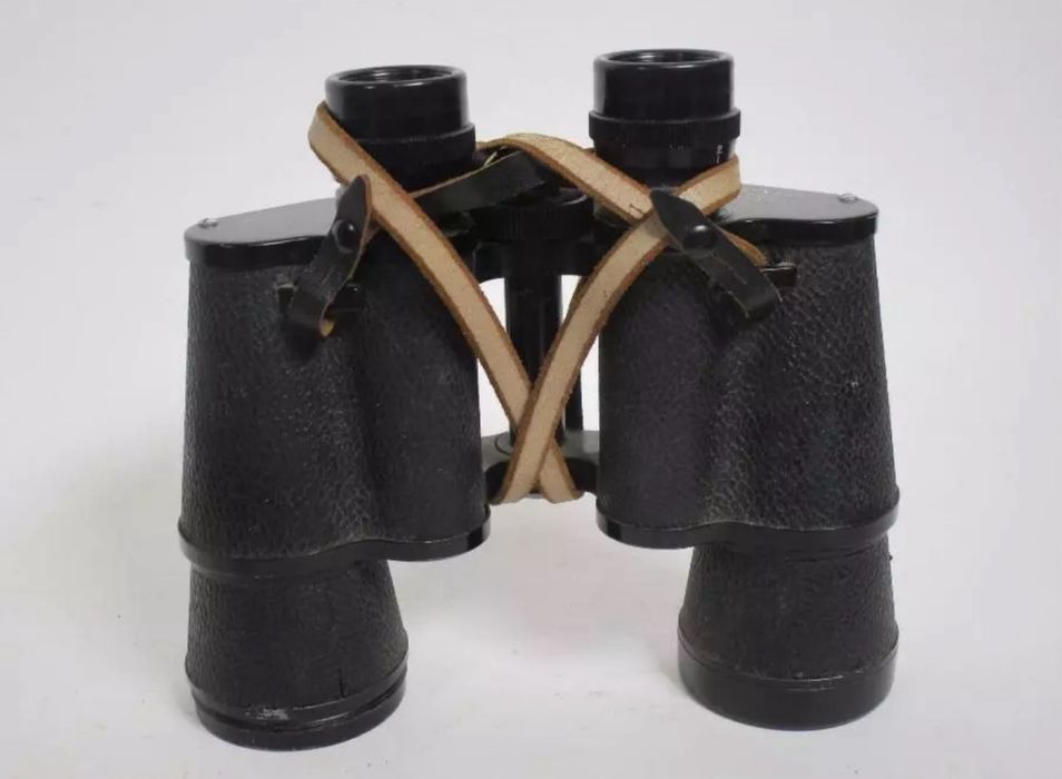 Binóculos antigos com bolsa