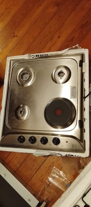 placa a gás com um bico elétrico