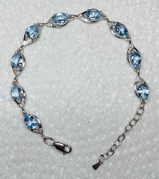 Золотой браслет с натуральными голубыми топазами, 11,07 г