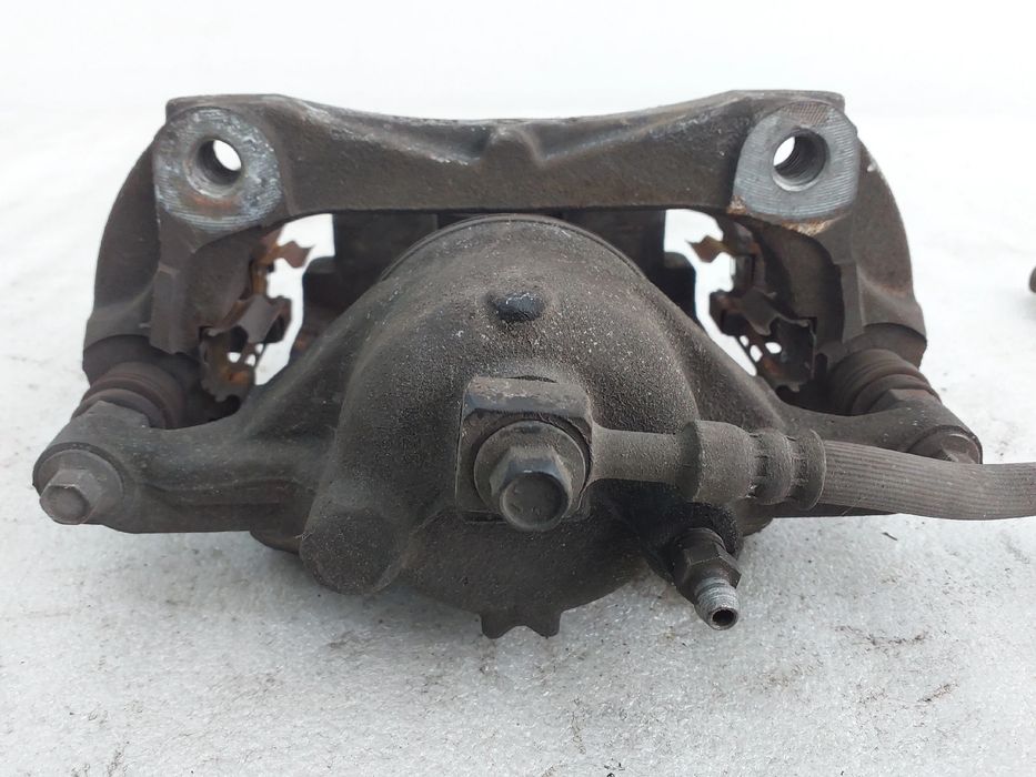 Pinça travão / maxila de travão frente esquerda OPEL Astra J