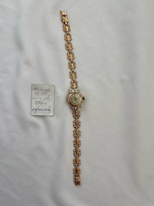 Золотий  жіночий годинник