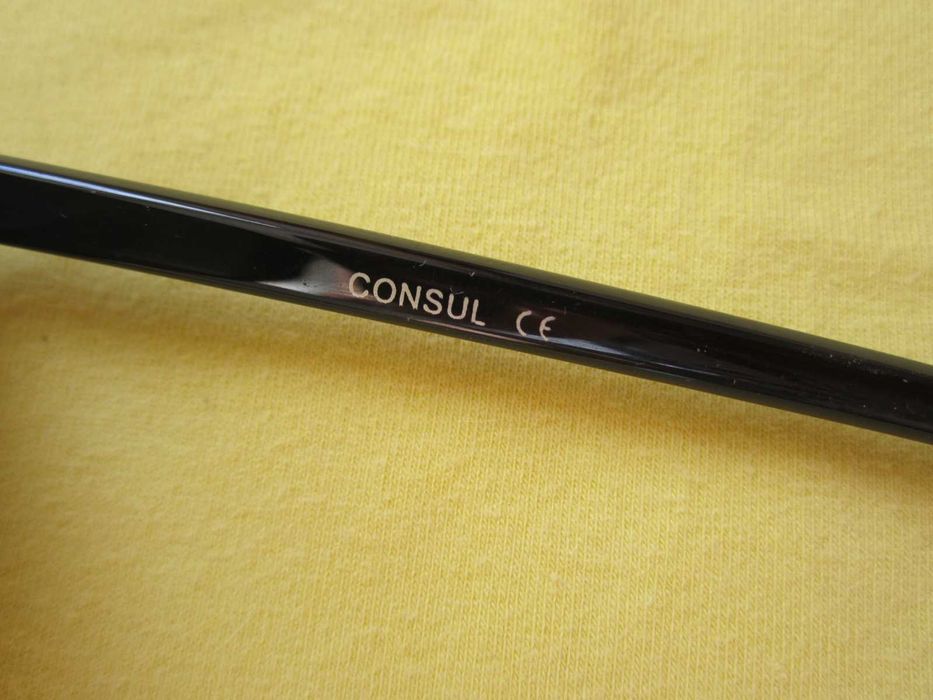 Очки солнцезащитные Consul Polaroid.