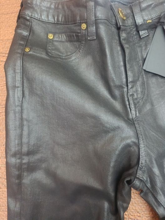 Calças ganga pretas boca de sino Pinko tamanho 34