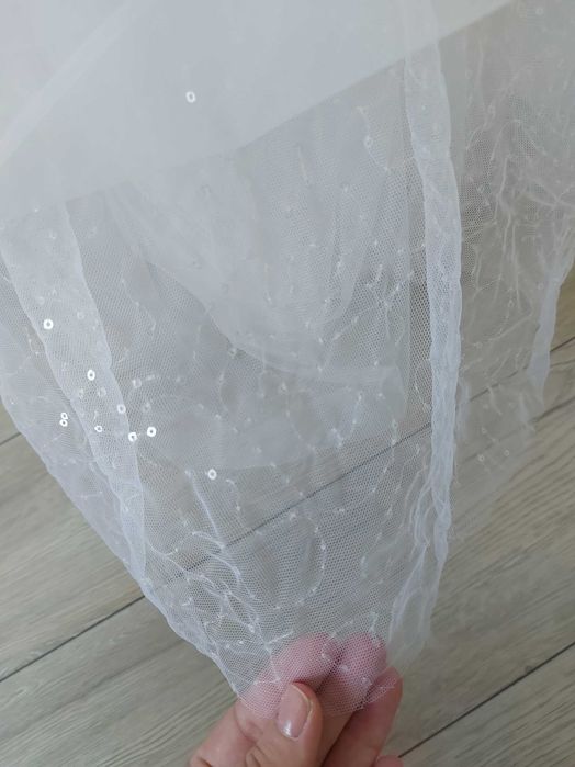 Delikatna suknia ślubna