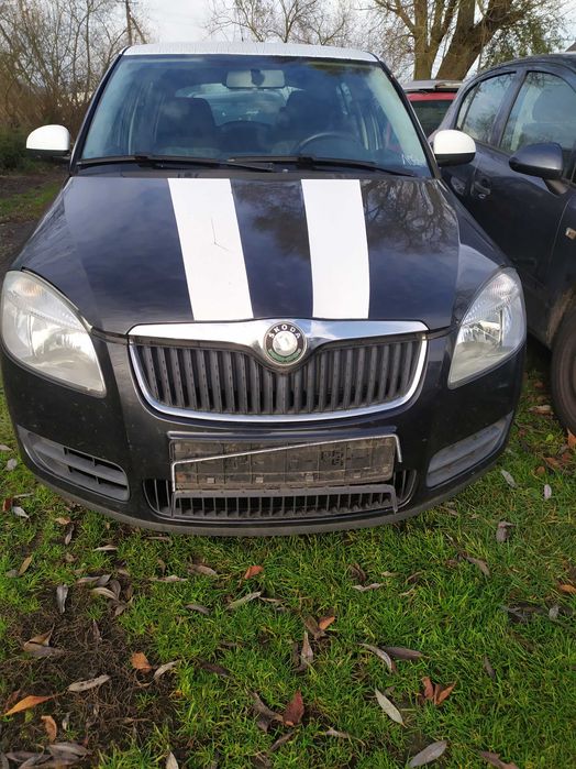 Skoda Fabia 2 Roomster maska pas 9910