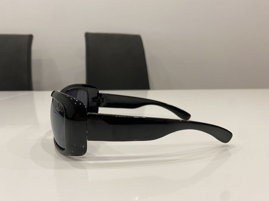 Oculos de Sol pretos