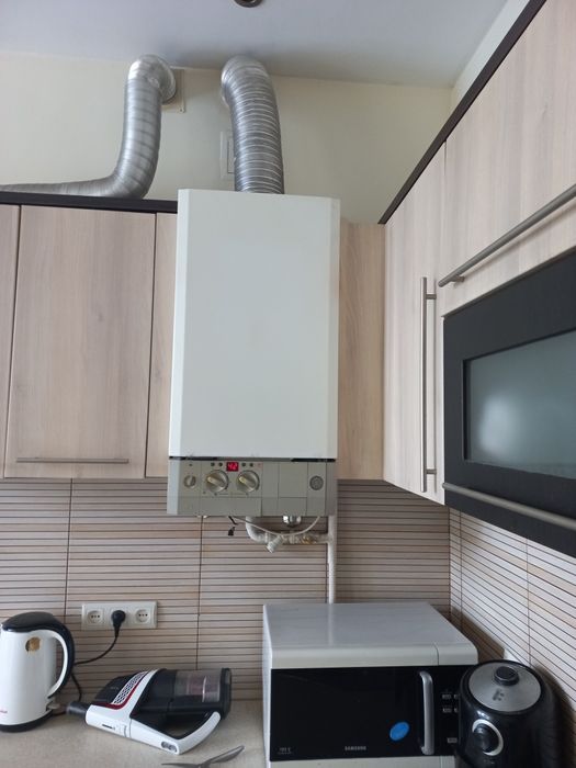 Оригінальний димохідний двоконтурний  газовий котел Bosch