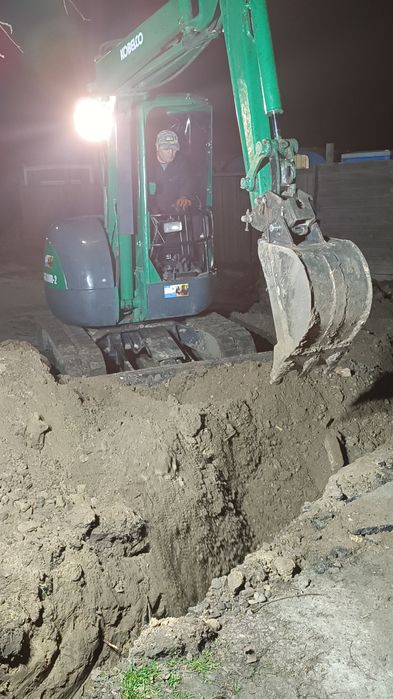 Мини екскаватор гусиничный  аренда доставка в любую точку города течен