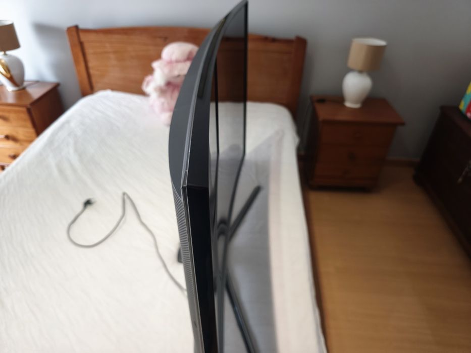 Televisao samsung 55 polegadas curva como nova