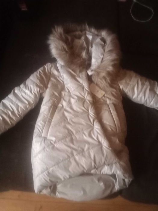 Куртка зимова, шапка,спортивний костюм на флісі. На 7-9 років