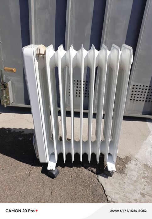 Масляний обігрівач Термостар, ( потужність 1,5кВт). Ціна 1200 грн.