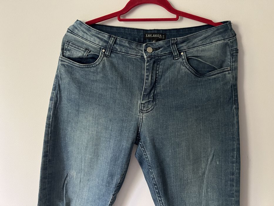 Jeansowe spodnie z postrzępieniami slim fit Top Secret roz. 42 / XL
