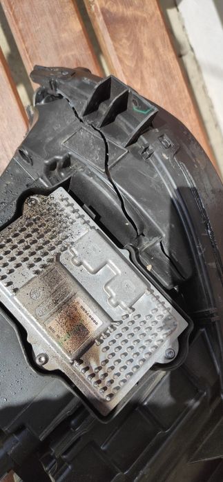 Lewa lampa Ford Fusion HS73-13E015-AF uszkodzona