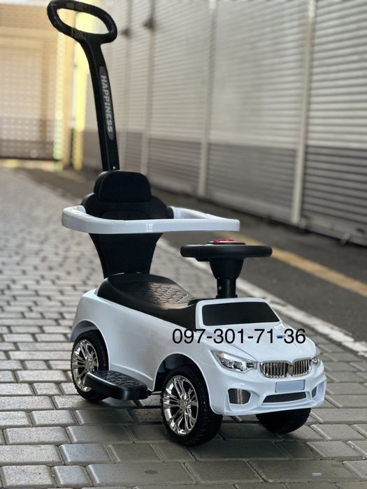 Толокар с ручкой поворотной БМВ музыка и свет, скидка!!!