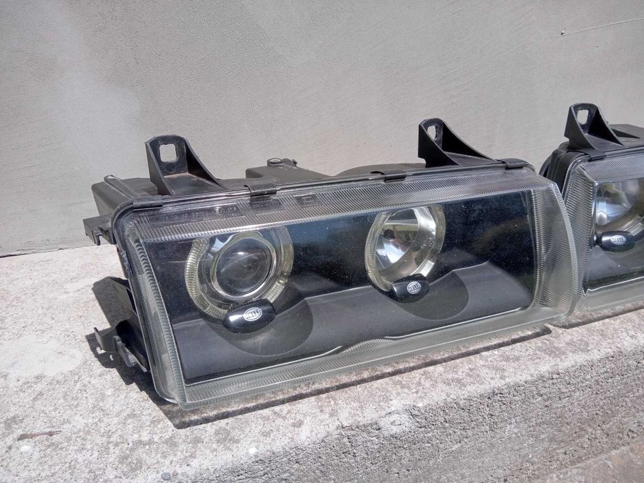 Lampy reflektory soczewki + ringi Hella Celis Black BMW E36 RARYTAS