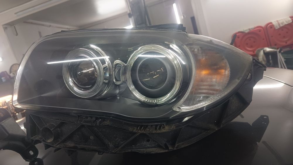 BMW e87 caly kpl przód lampy zderzak człowka ksenon