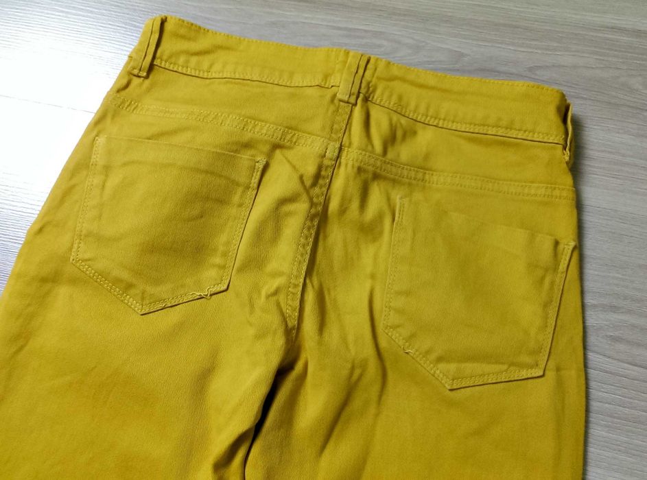 Damskie spodnie jeansy żółte musztardowe rozciągliwe Asos 36