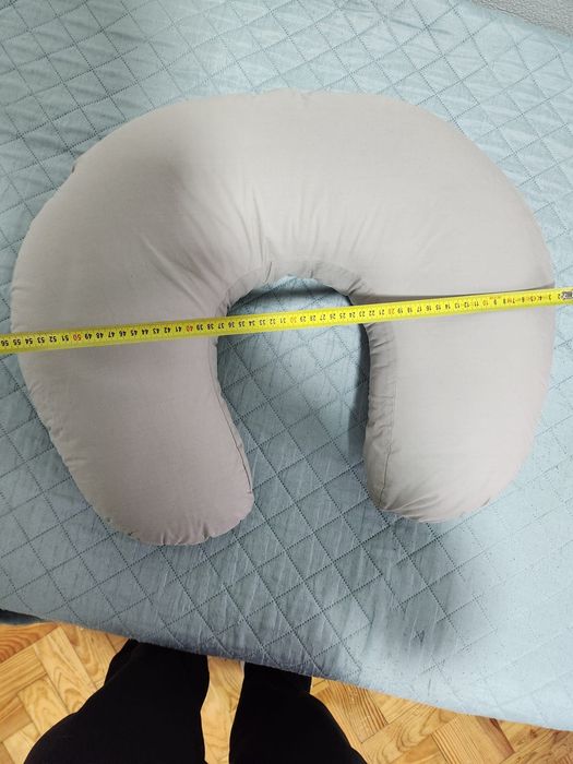 Almofada de amamentação como nova