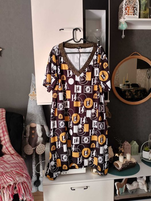 Zgrabna i elegancka sukienka na lato - rozmiar 50/52/54