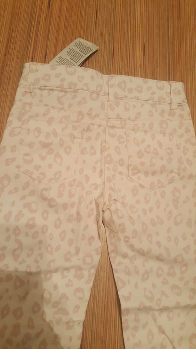 Nowe spodnie rozm.122