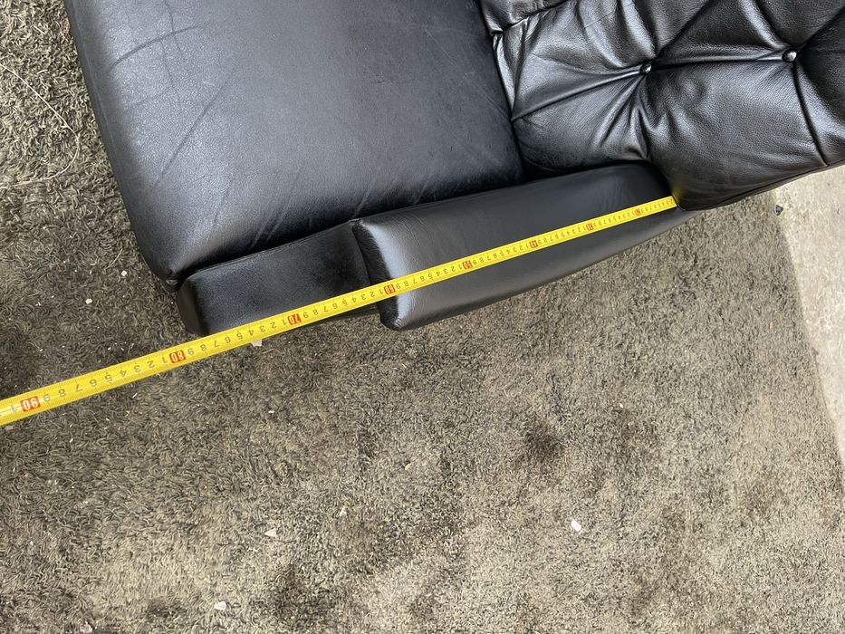 Шкіряне крісло реклайнер