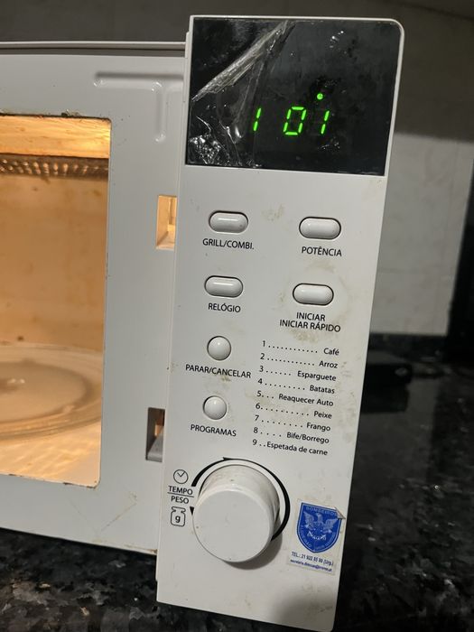 Microondas usado com relogio