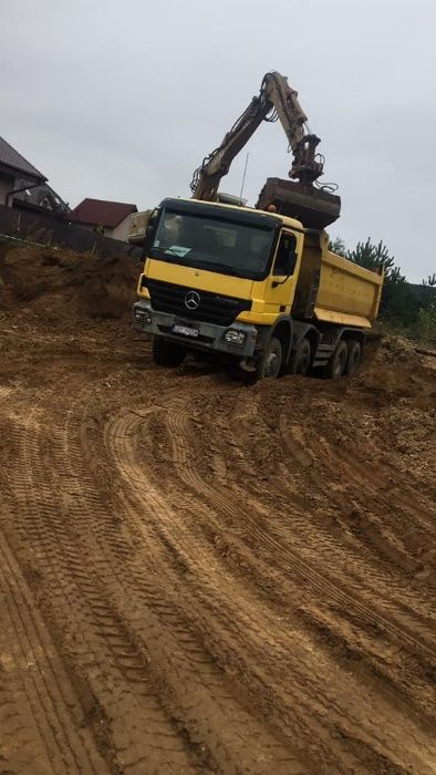 roboty ziemne koparki JCB kruszywo rozbiórka wykopy transport