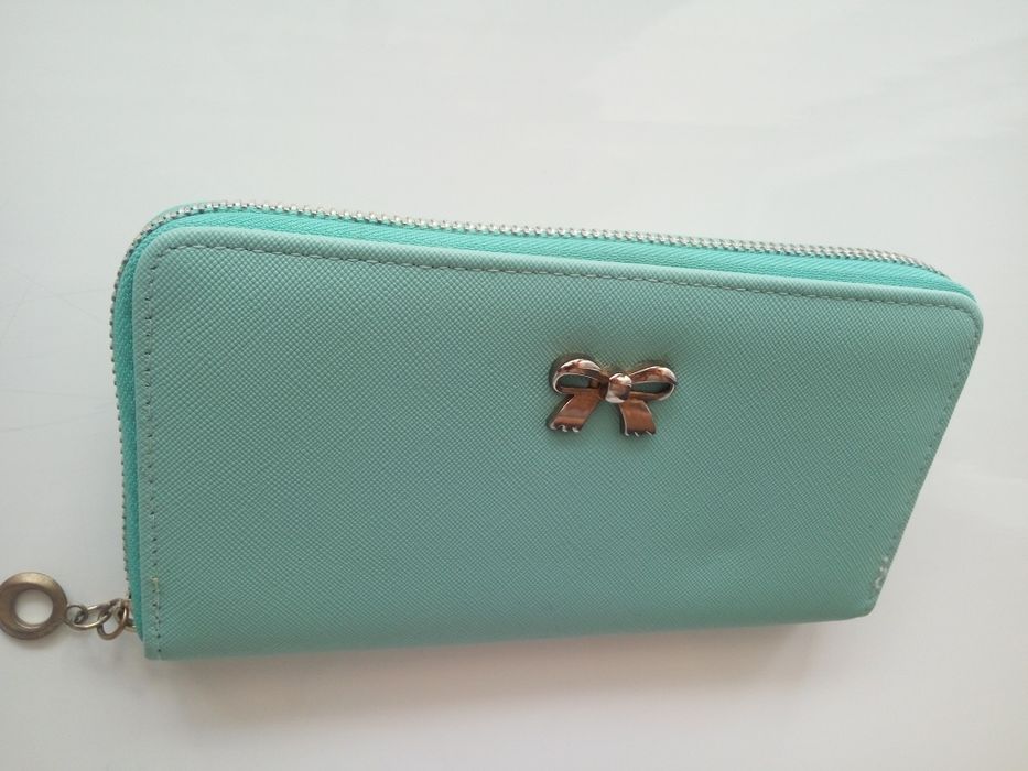 Гаманець м'ятного кольору багато кишеньок розмір 19*11см