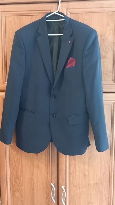 Garnitur męski Doris Simon.