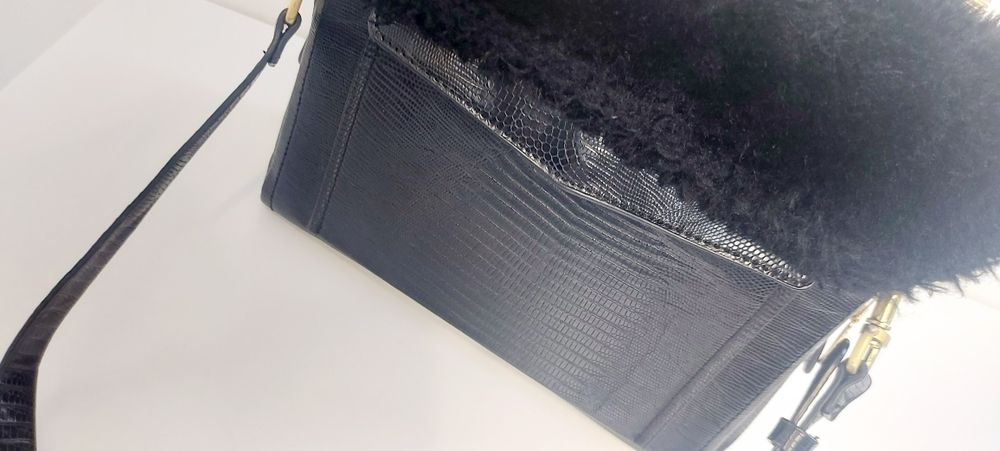 Mala mão ou tiracolo