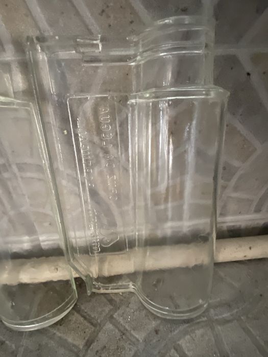 Telhas de vidro e de plastico