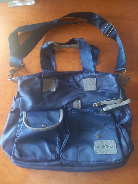 Mala multiusos com varias bolsas