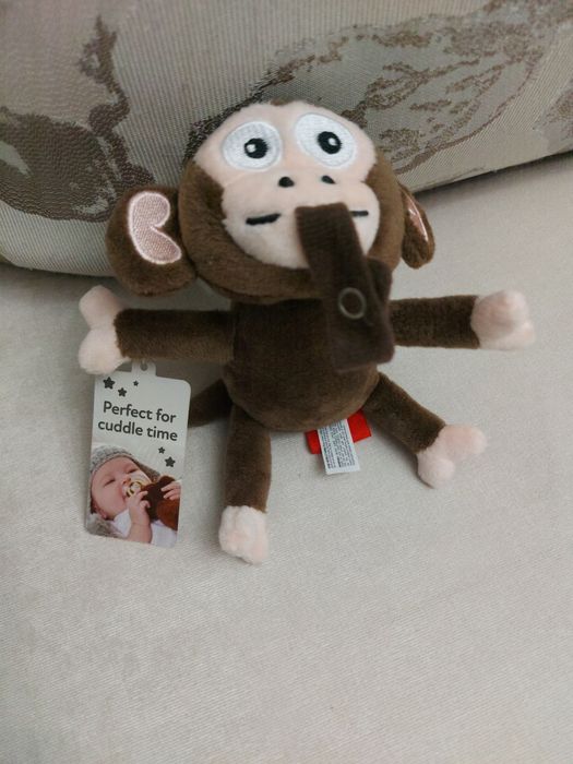 Іграшка мавпа тримач для пустушки