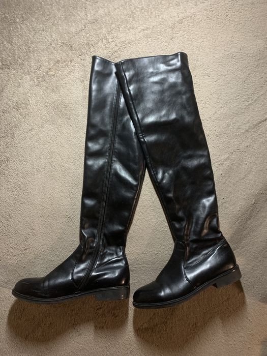 Високі сапоги