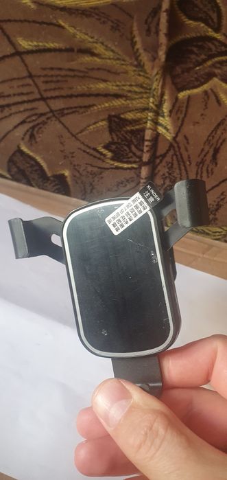 Тримач телефона із зачепом