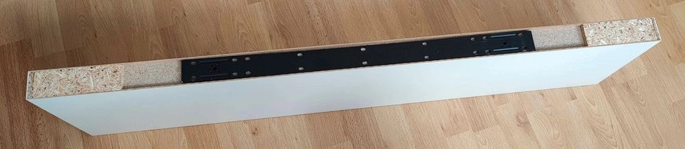 .Biała półka ścienna IKEA Lack 110x26 cm wisząca z ukrytym mocowaniem