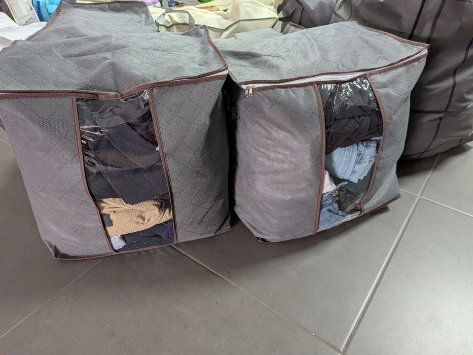 Conjunto de 7 caixas com mais de 100 peças de roupa – Mulher, Homem e Criança (menino e menina)