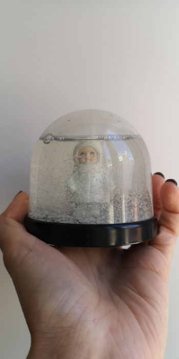 Globo de neve com criança