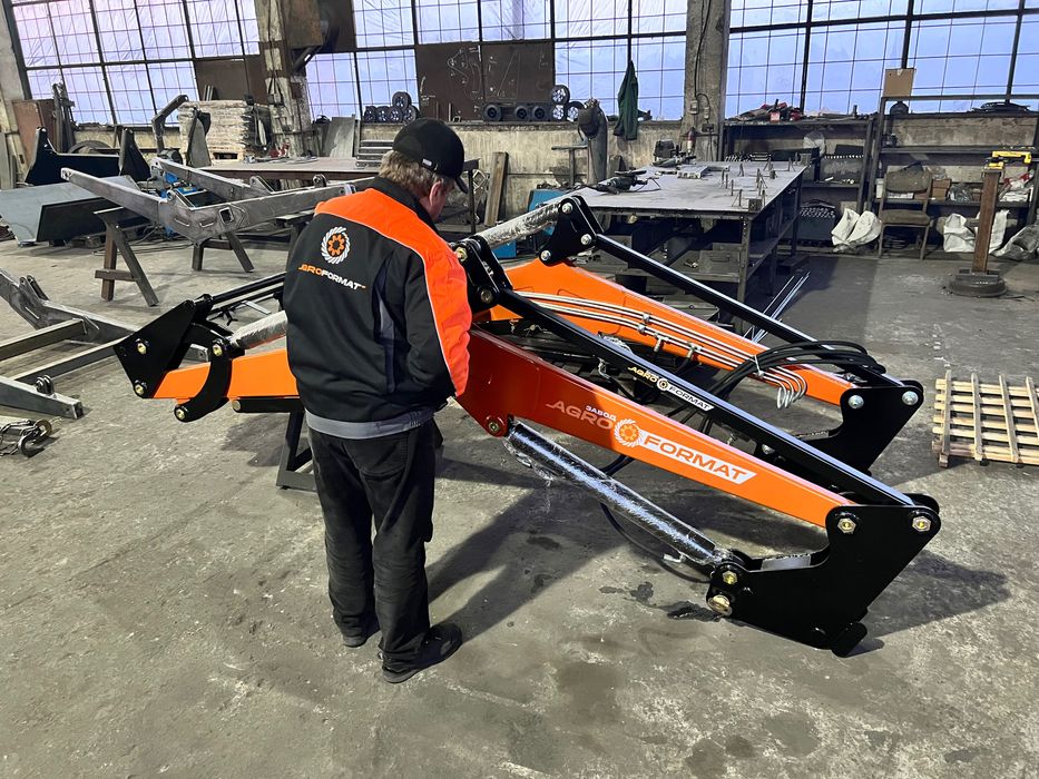 Быстросъёмный погрузчик КУН-1800 на трактор МТЗ ЮМЗ Т-40 с ковшом 1 м3