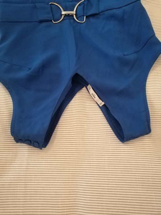 Macacão de manga à cava