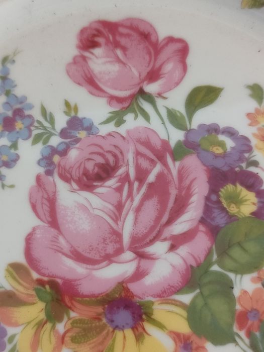 Conjunto de pratos em porcelana "Limoges".