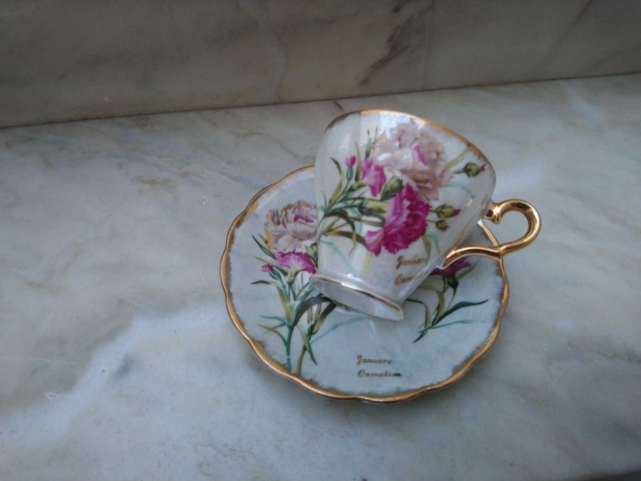 Conjunto de chávena de chá e pires de porcelana japonesa Ucagco