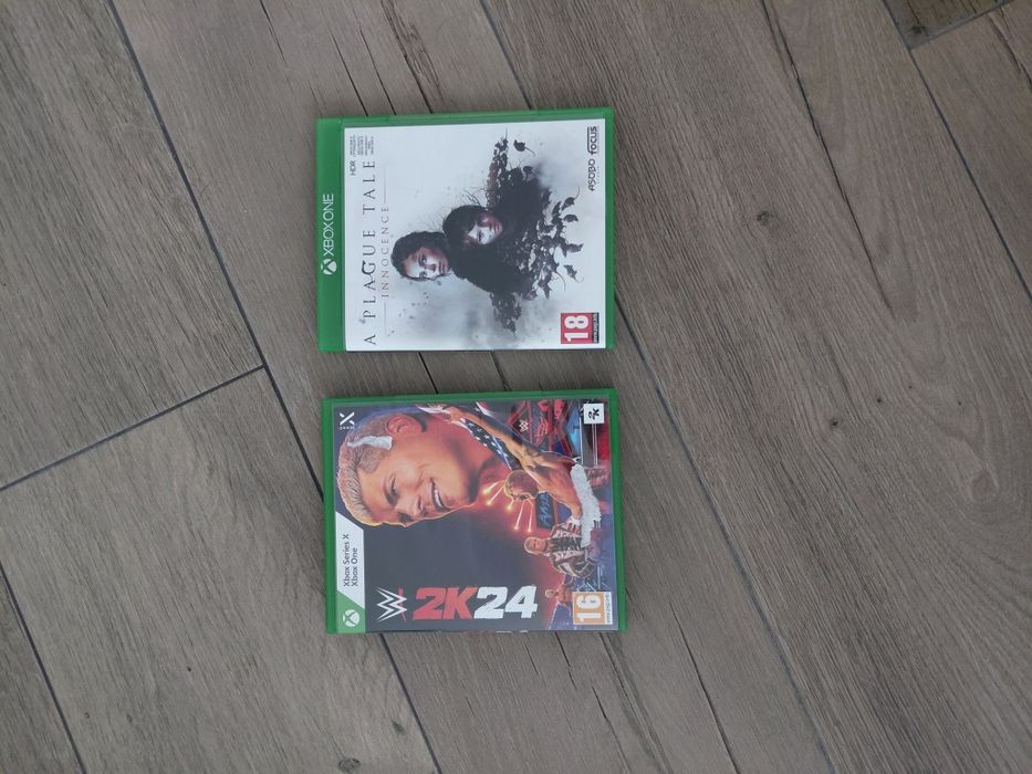 XBox One X com acessórios e conta com vários jogos