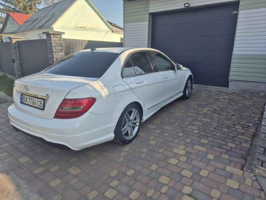 Mercedes-Benz C-Class 2014 VIN WDDGF4HB6EA959629 фото оголошення 2 з 8