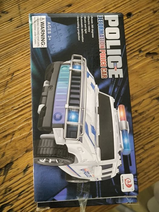Prezent święta NOWY. Mikołaj Interaktywny pojazd policyjny policja dla dzieci Transformers świeci