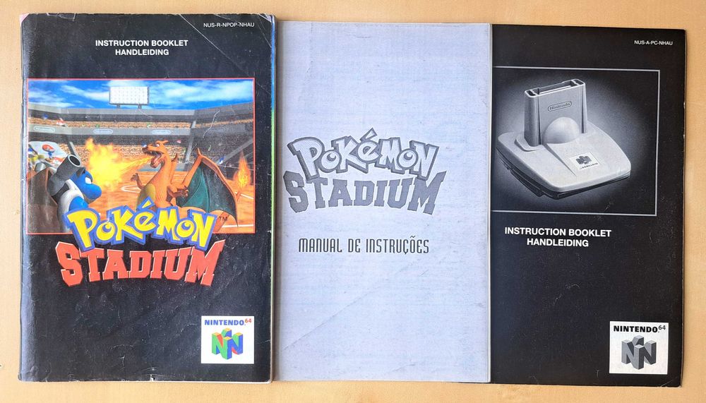 Pokémon Stadium (N64 PAL) + Transfer Pak + Pokémon Yellow + Manuais (Internacional & Português)