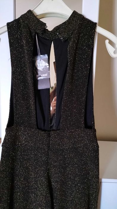 Macaco preto e dourado